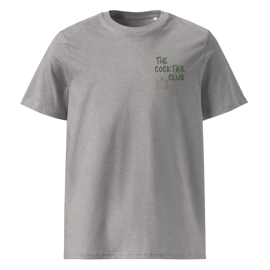 Introducing the Tequila & Sunrise "The Cocktail Club" Organic T-shirt: an eco-friendly and stylish unisex tee crafted from gray organic cotton, featuring the green text "THE COCKTAIL CLUB" on the upper left front. Ideal for those who value sustainability in their fashion choices.