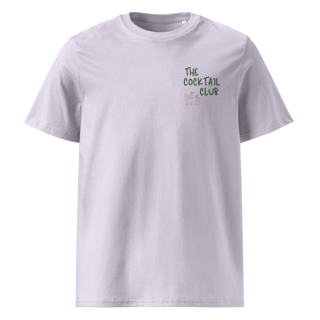 The Cocktail Club Organic T-shirt by Tequila & Sunrise is an eco-friendly unisex shirt made from organic cotton, showcasing THE COCKTAIL CLUB printed in green on the front left side. Ideal for those who value sustainability while maintaining style and comfort.