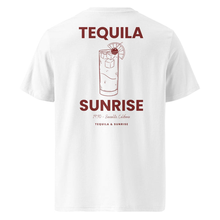 The Tequila & Sunrise Organic T-shirt by Tequila & Sunrise is an eco-friendly white graphic tee that showcases a vibrant cocktail illustration along with the phrase "Tequila Sunrise, 1920 - Ensenada, California" in bold red letters.