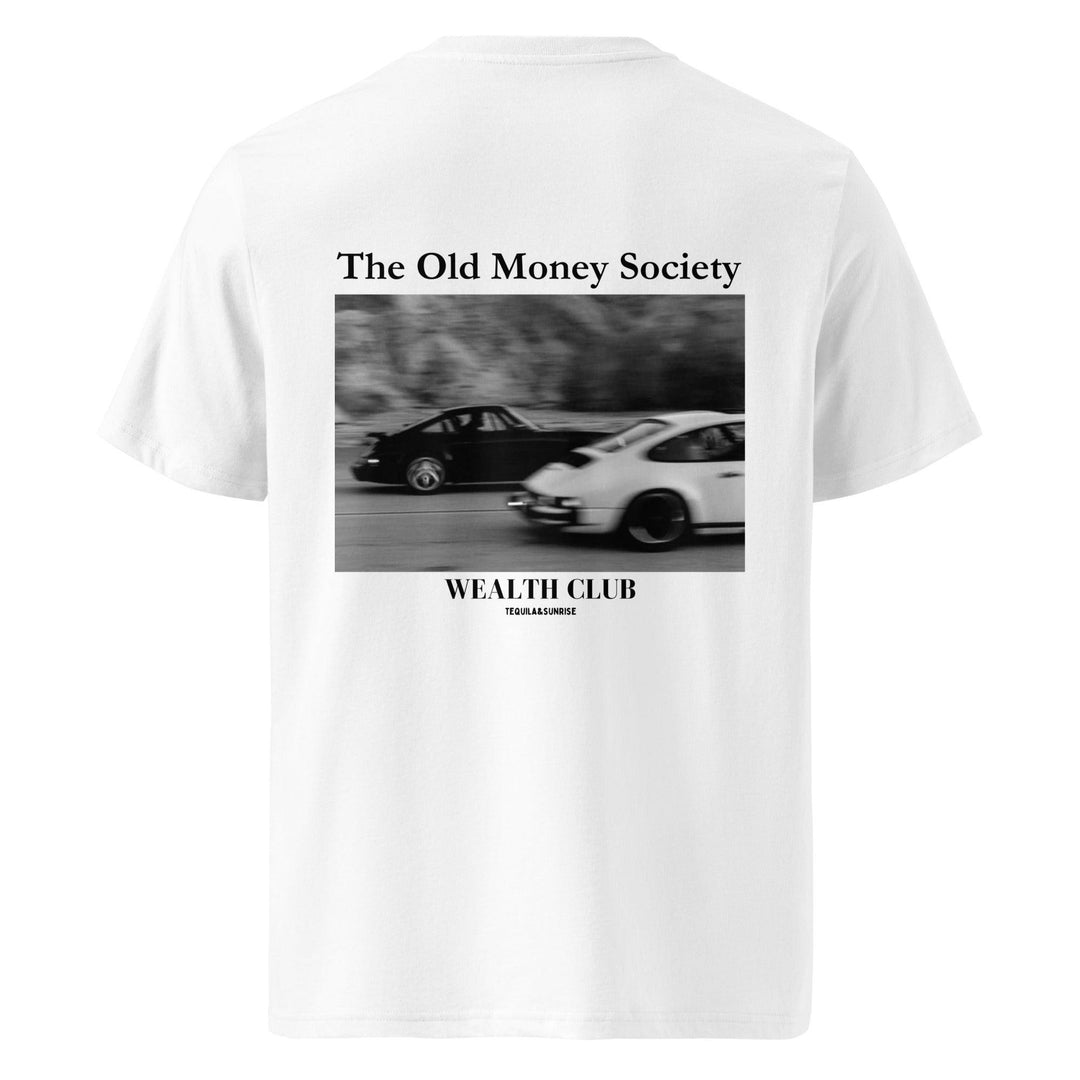 This eco-friendly white t-shirt, named The Old Money Society Organic T-shirt by Tequila & Sunrise, is crafted from organic cotton and features a black and white image of two cars in motion. With "The Old Money Society" at the top and "Wealth Club" beneath, it elegantly merges style with sustainable comfort.