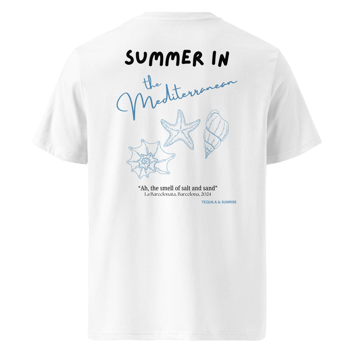 The Summer in the Mediterranean Organic T-shirt by Tequila & Sunrise is a unisex garment made from organic cotton, featuring the "Summer in the Mediterranean" text along with starfish and shell designs. This eco-friendly piece also includes a quote that celebrates salt and sand.