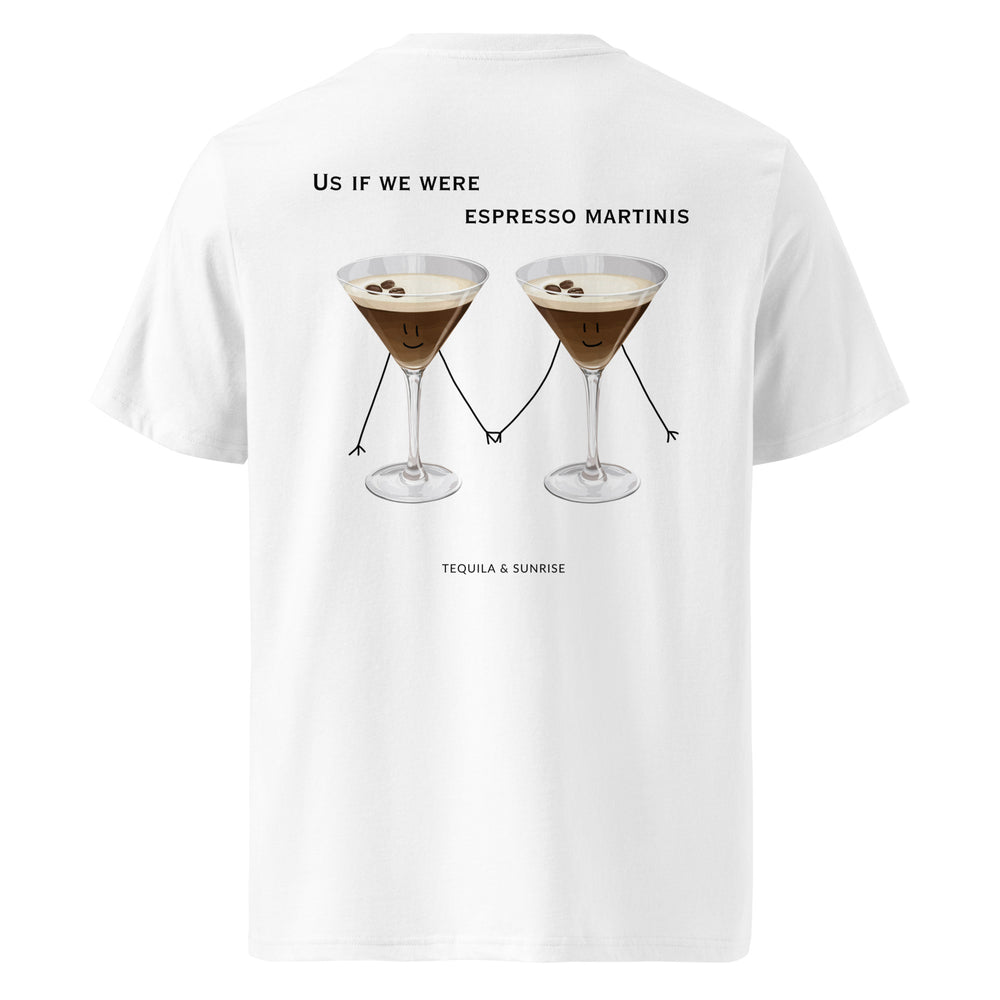 Introducing "The If We Were Espresso Martinis Organic T-shirt" from Tequila & Sunrise. This unisex, white eco-friendly tee is crafted from organic cotton and showcases two illustrated espresso martinis with smiling faces holding hands. Captioned "Us if we were espresso martinis," it offers a playful yet sustainable style statement.