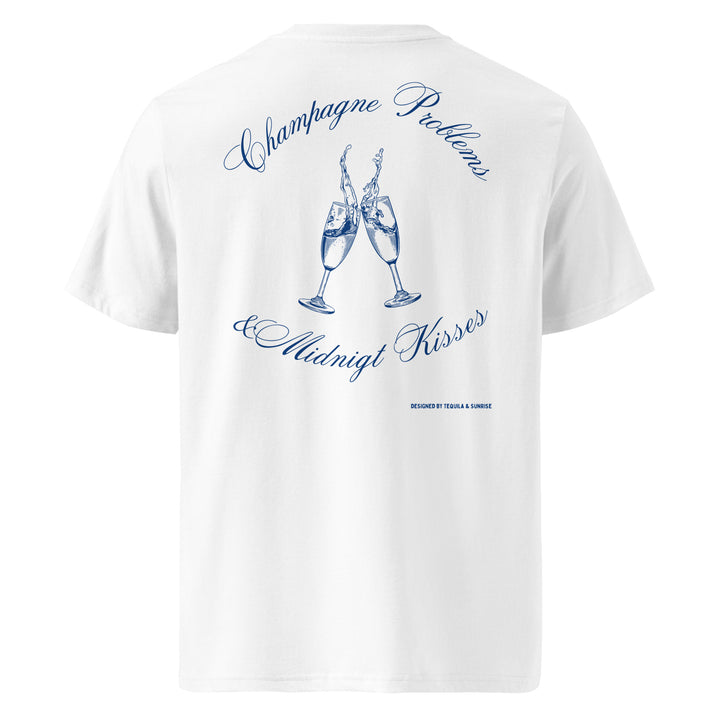 Champagne Problems & Midnight Kisses Organic T-shirt featuring elegant champagne glasses design in blue on a white background.