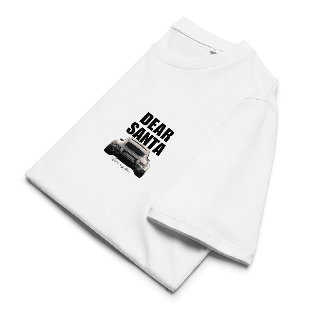 The Dear Santa Organic T-shirt from Tequila & Sunrise is a unisex white tee, featuring a "Dear Santa" text and a car image on the front, made from organic cotton for an eco-friendly option.